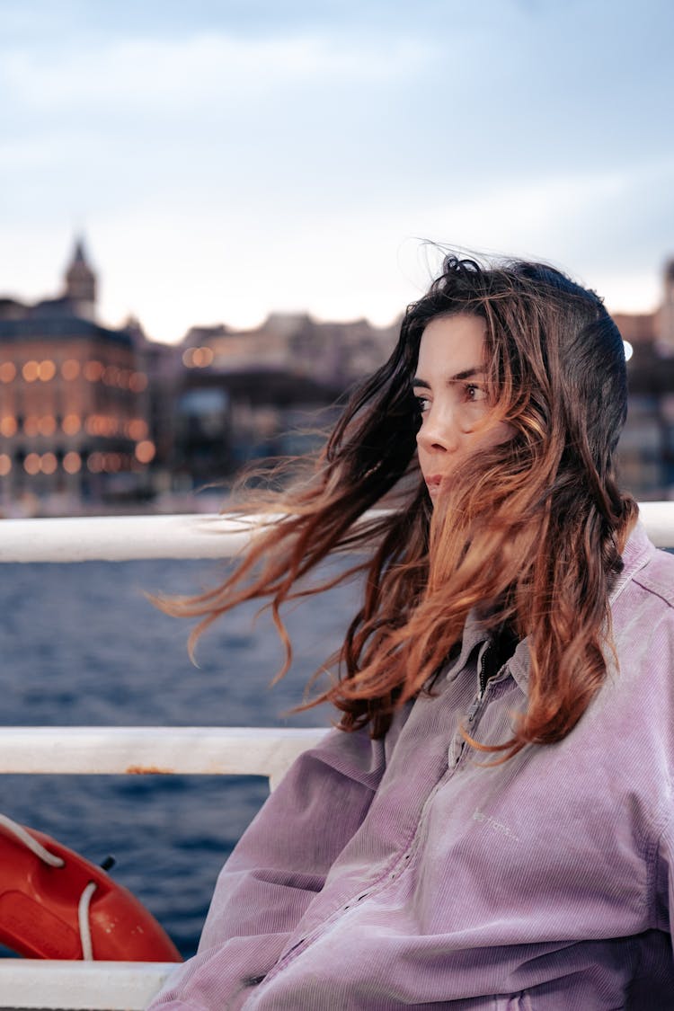 Woman Standing On Ship Deck 