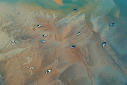 Aerial Photography Of Boats On Shore