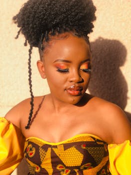 Close-up portrait of a stylish woman in vibrant attire with bold makeup.
