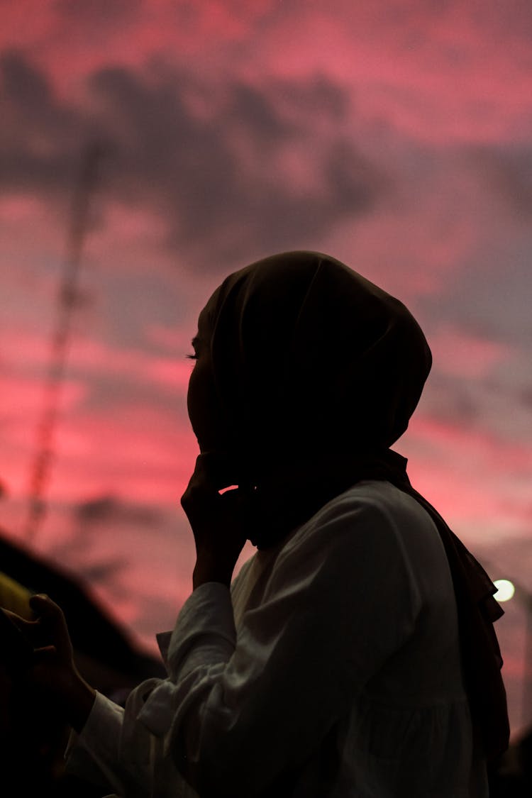 Silhouette Of A Woman In Hijab