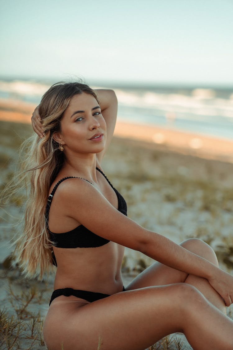 Tanned Model Posing On A Seaside