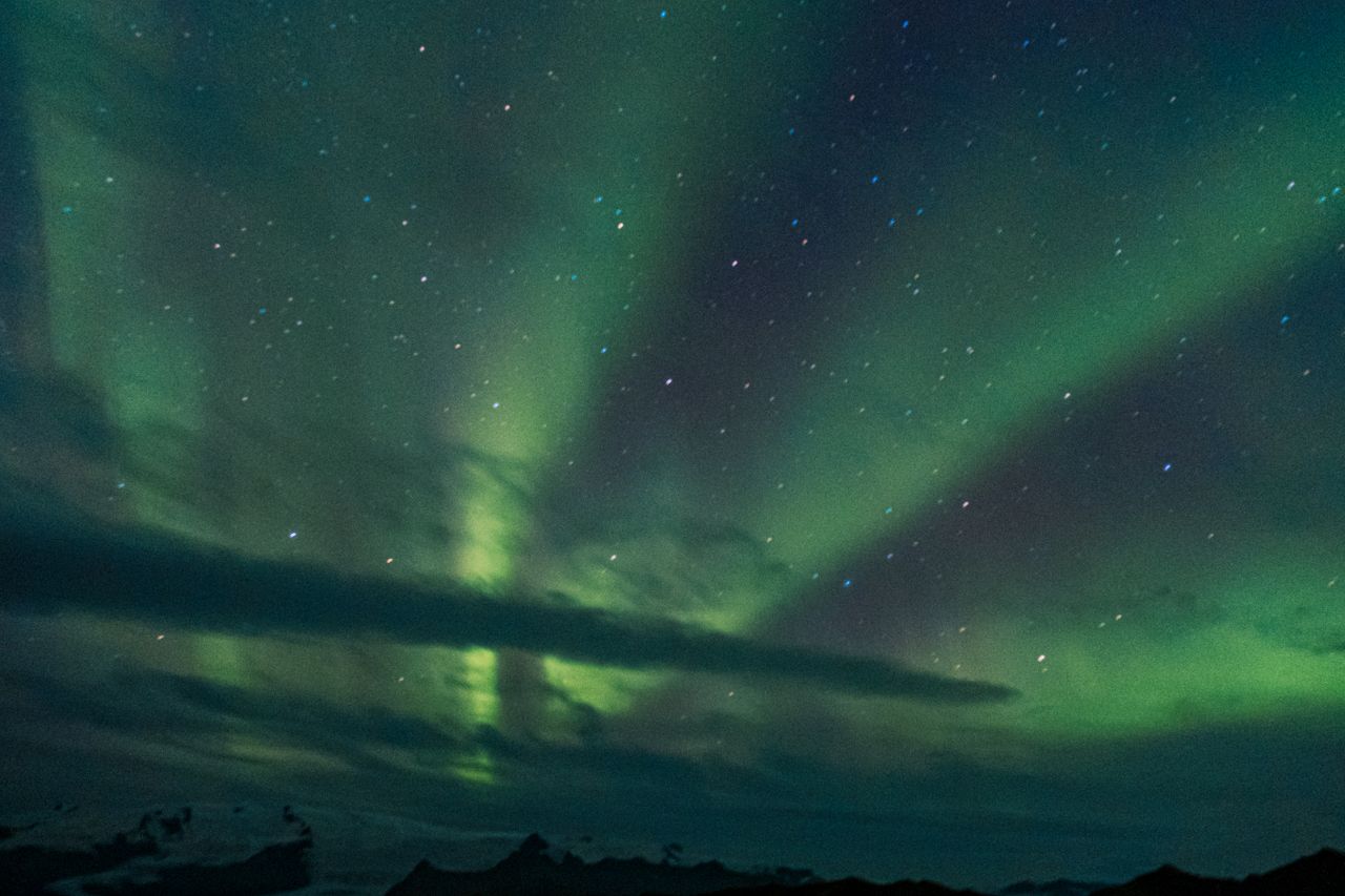 beautiful aurora borealis dancing across a starry night sky captured i
