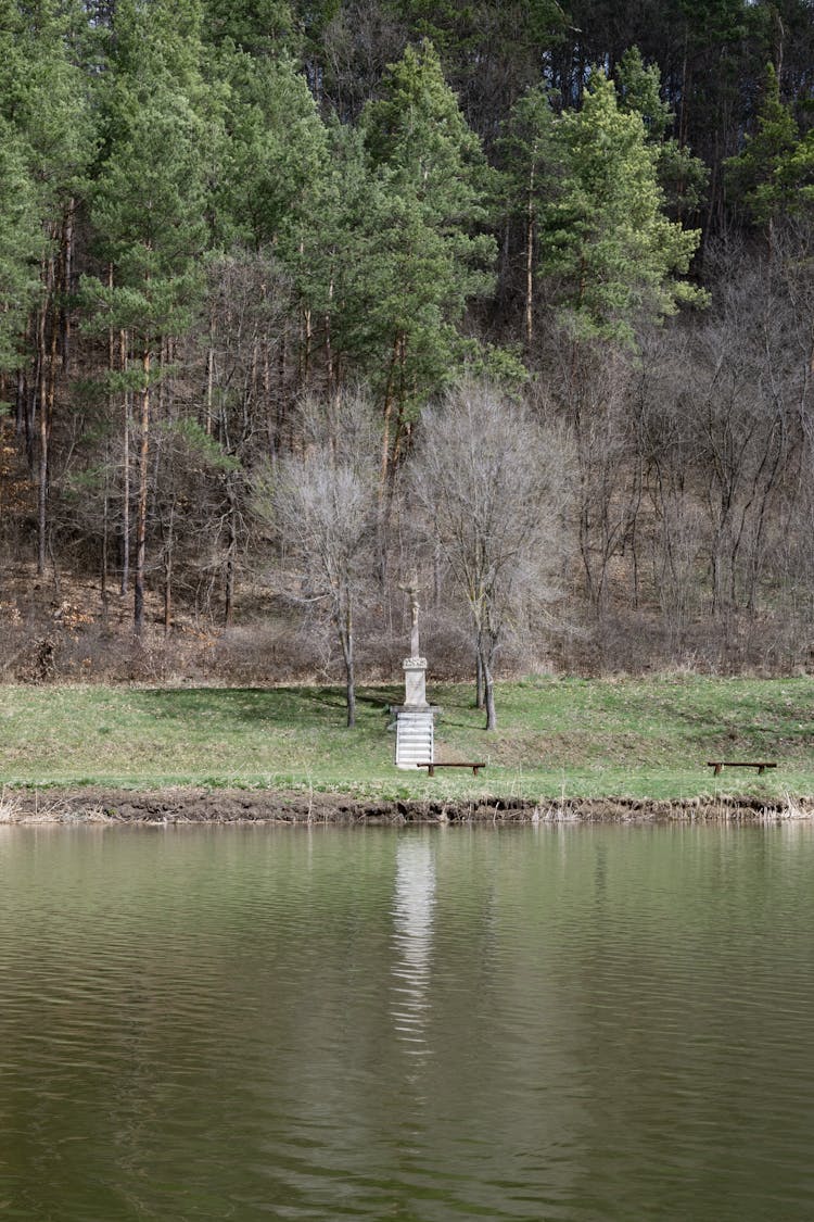 Landscape With Forest And A Monument By A River