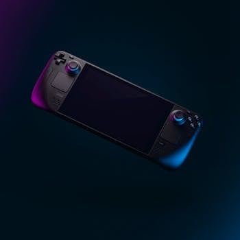 Elegant handheld gaming device with colorful backlighting against a dark backdrop.