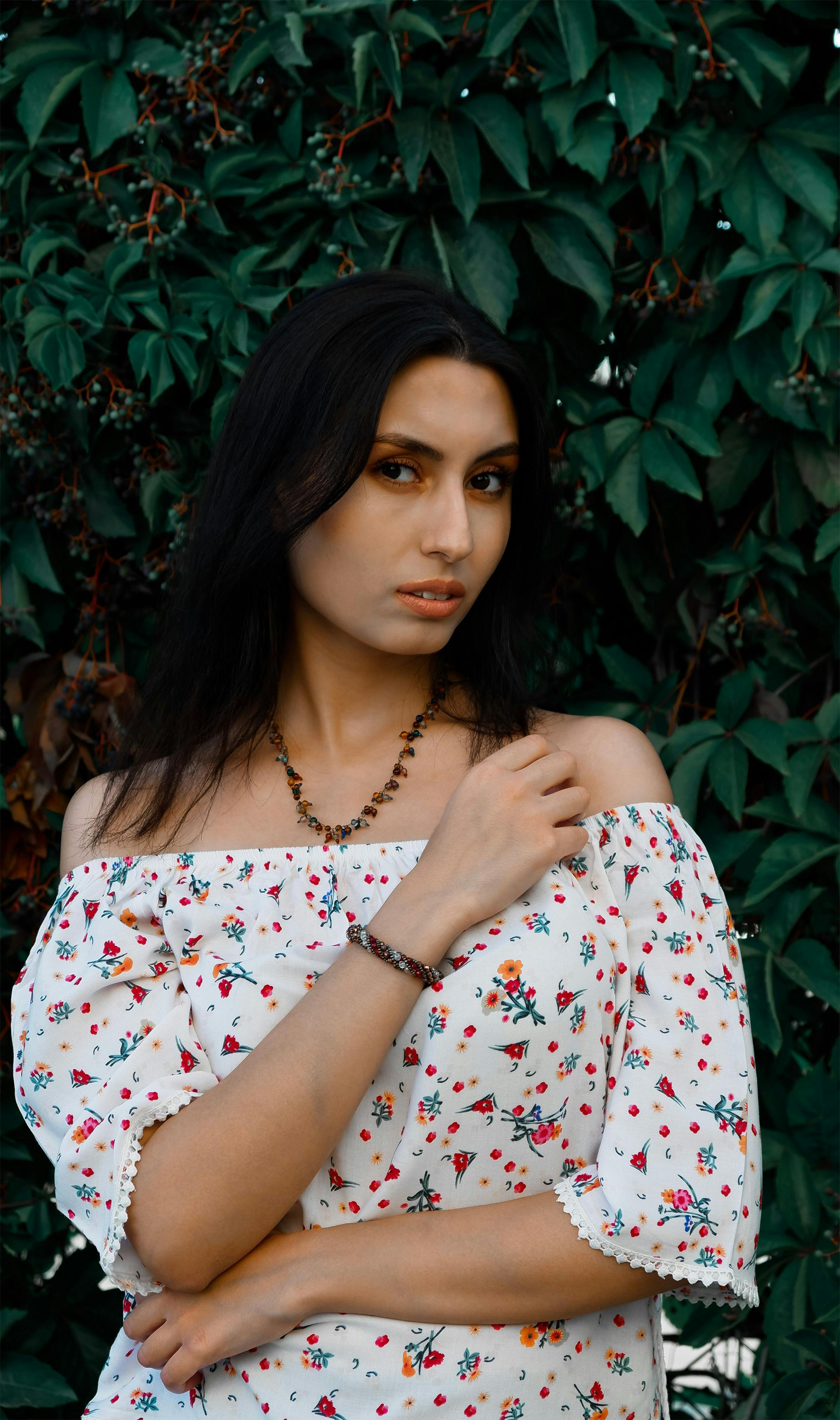 portrait-of-woman-in-white-floral-print-dress-free-stock-photo