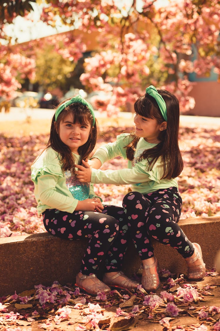 A Twin Sister Wearing Headband