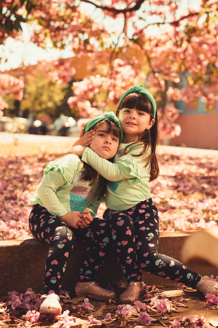 Little Twin Girls Hugging 