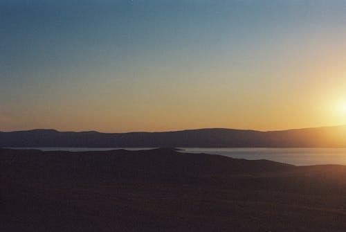 Silhouette of Mountain during Sunset