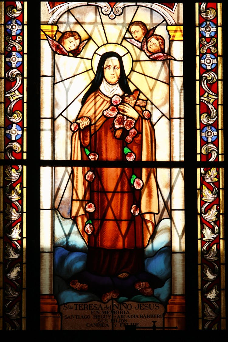 A Stained Glass Image Of Saint Therese Of Lisieux