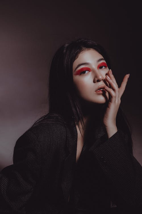 Young Woman with Pink Eye Makeup 