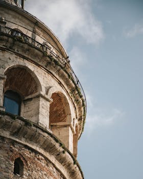 Detailed close-up of historical Galata Tower showcasing intricate architectural details.