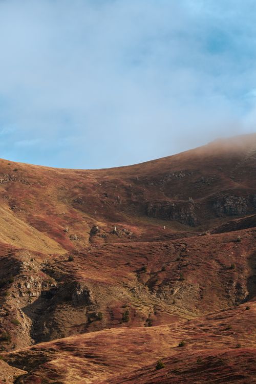 Free Captivating view of a Shkodër mountain in autumn colors and mist. Stock Photo