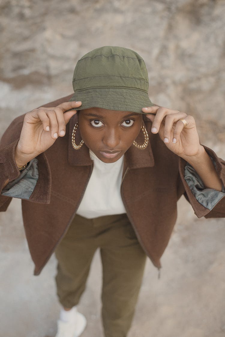 Woman In Hat Posing In Desert