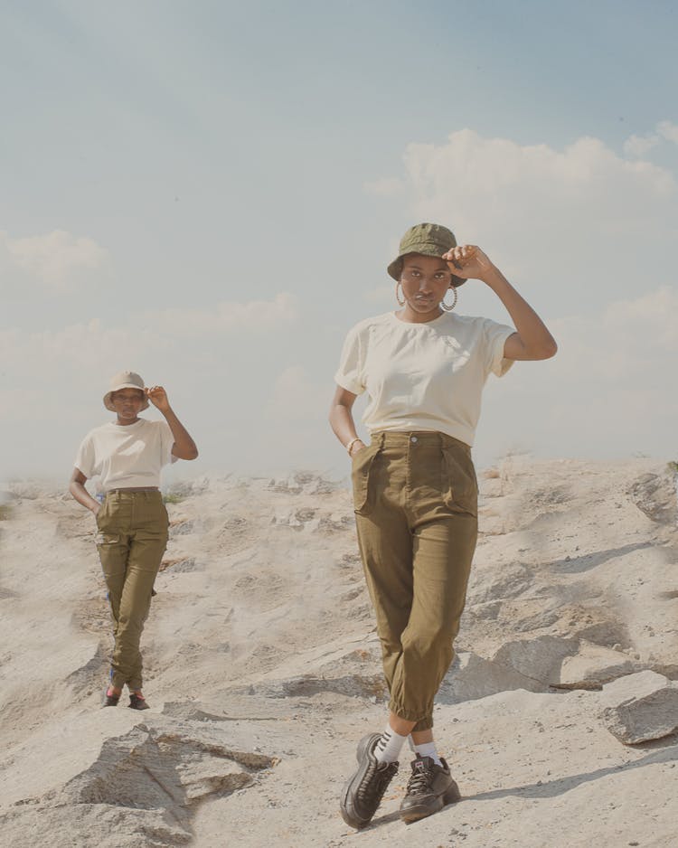 Women Posing In Cargo Pants In Desert