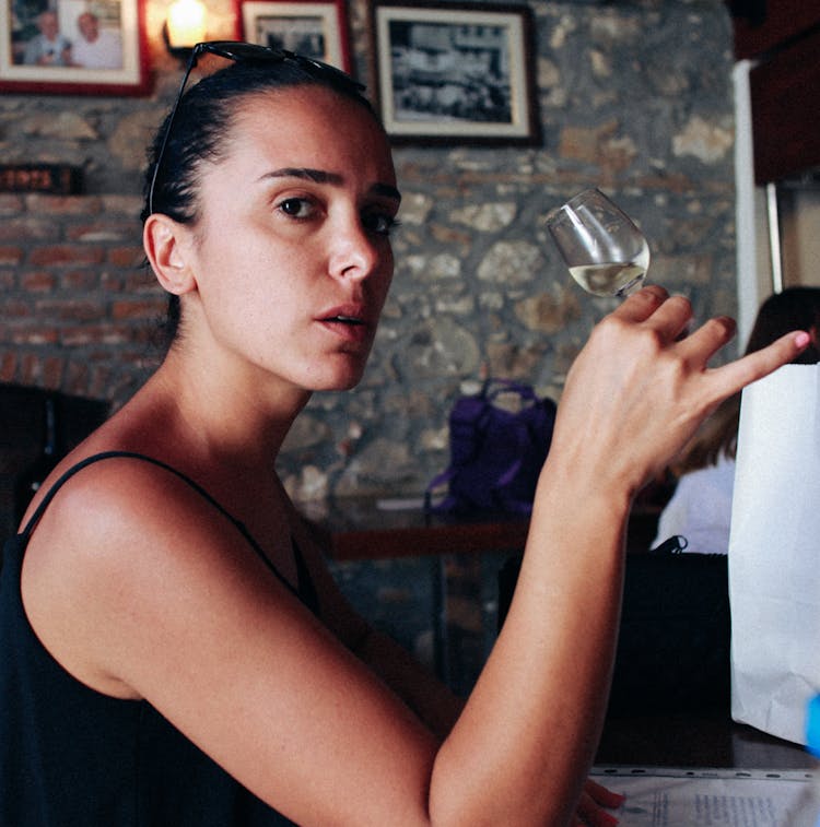 A Pretty Woman Drinking Wine 