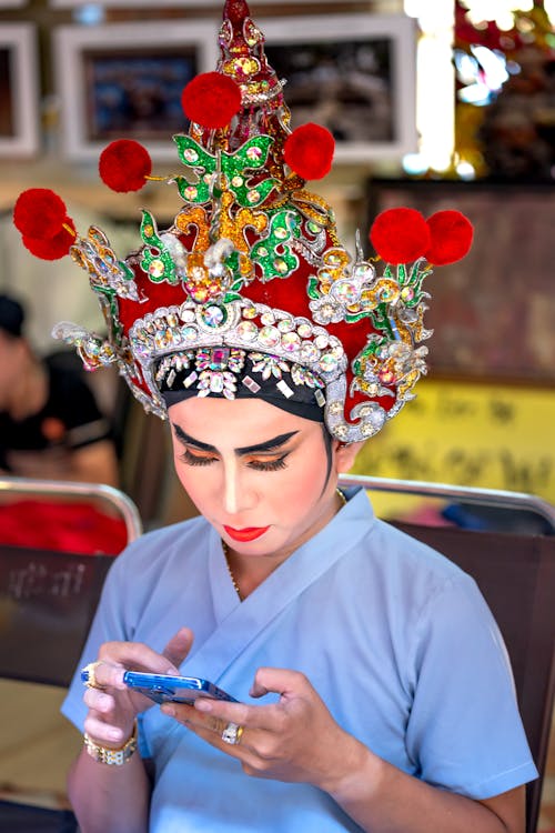 Woman Preparing, Wearing Traditional Clothing and Makeup