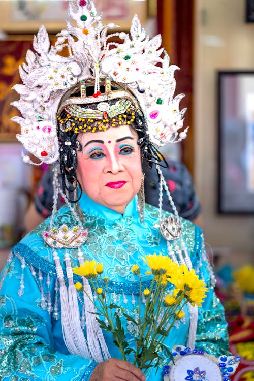 Woman Wearing Traditional Clothing and Makeup