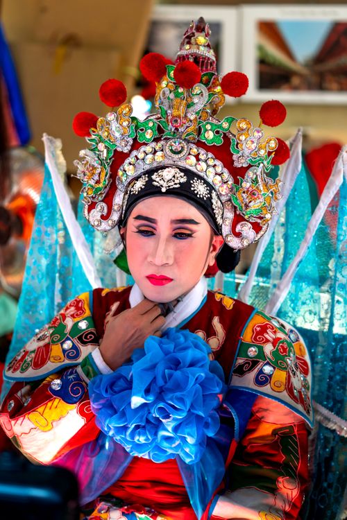 Free Close-up portrait of a performer in traditional Chinese opera costume, showcasing ornate headwear and vivid colors. Stock Photo
