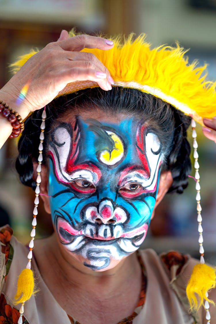 Portrait Of Person In Colorful Face Paint