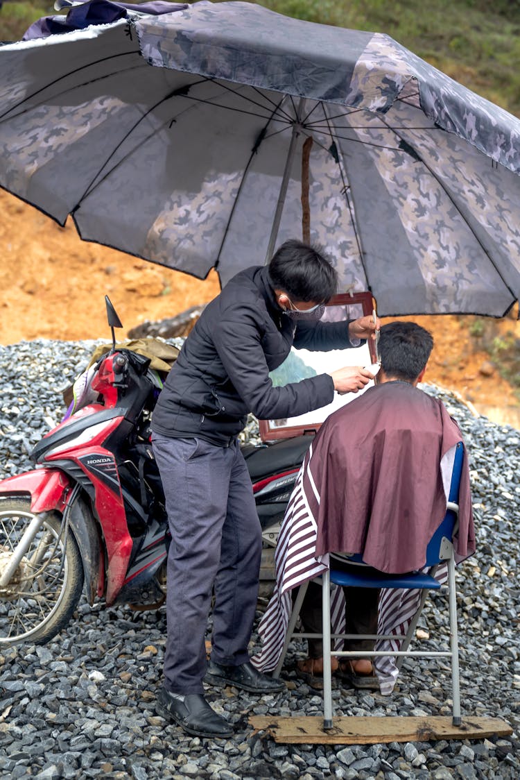 A Man Getting A Haircut