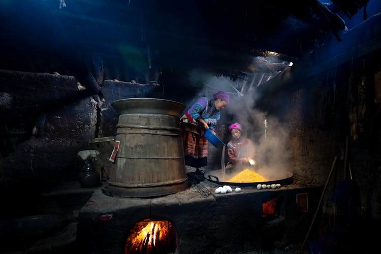 Women Cooking A Delicacy