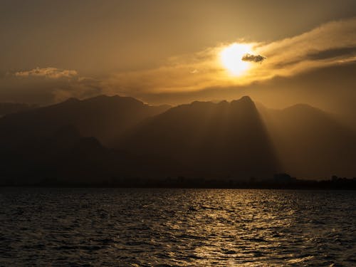 ada, akşam karanlığı, altın saat içeren Ücretsiz stok fotoğraf
