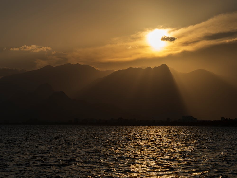 Silhouette of Mountains During Golden Hour