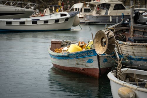 Fishing Boats Docked on River