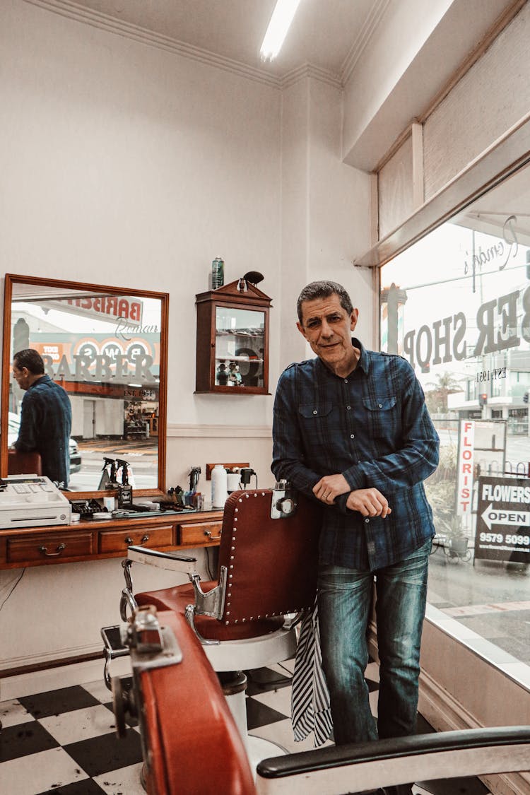 Hairdresser Standing In Empty Studio