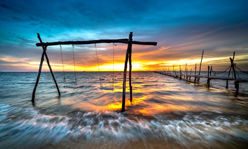 Wooden Swing on the Shore