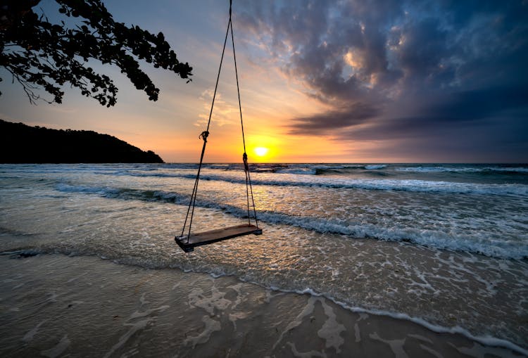 Photo Of Swing At The Beach