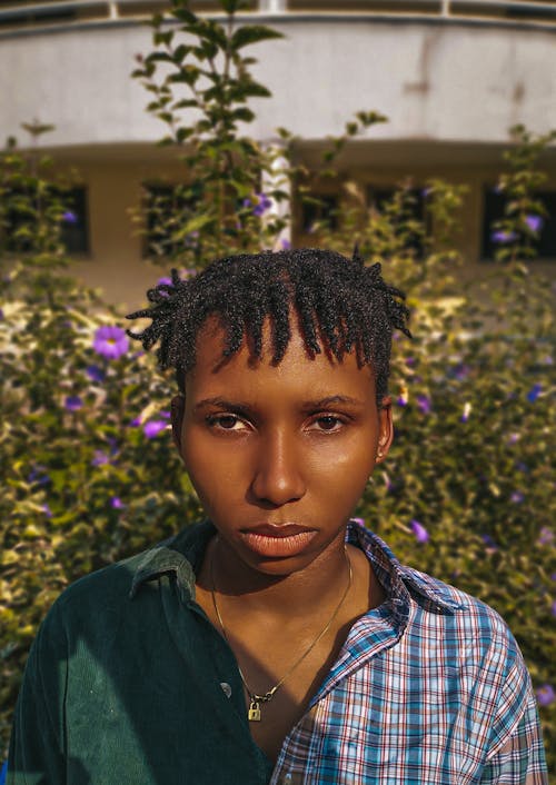 Portrait of a Young Woman with a Short Curly Hair