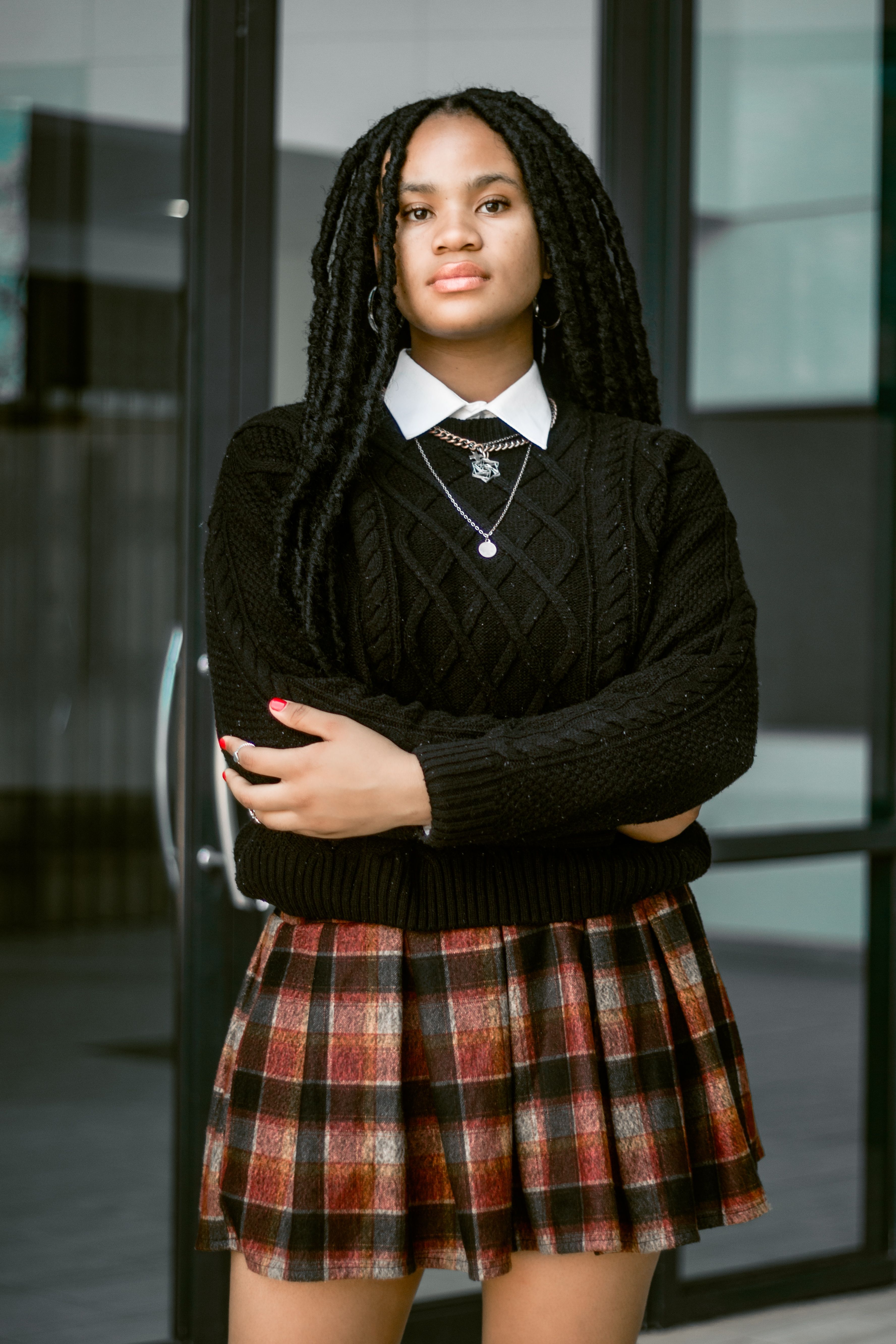 Cable-Knit Sweater and Plaid Skirt