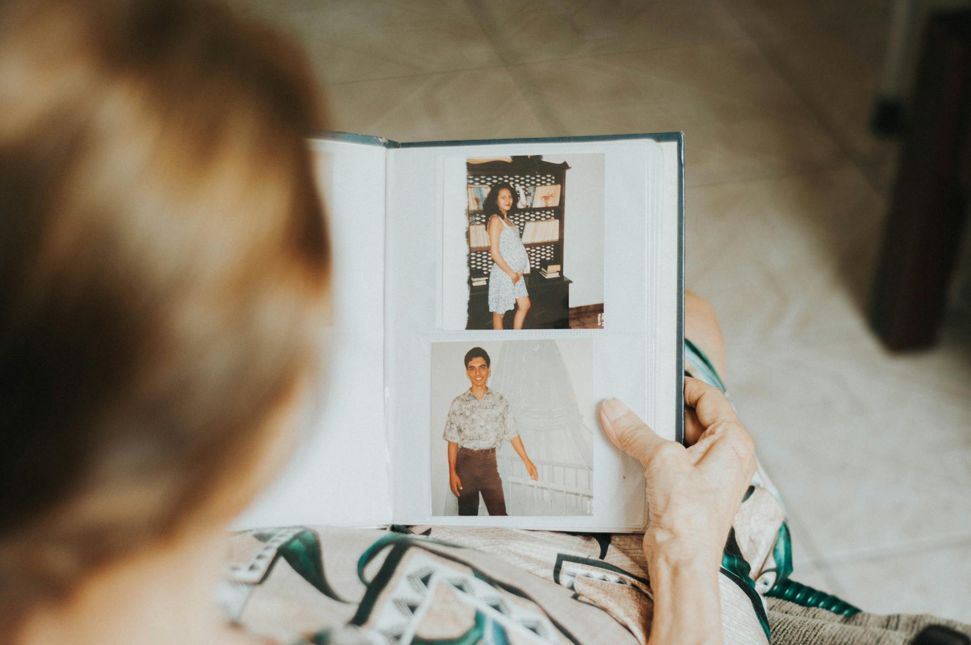 A Person Looking at the Photo Album