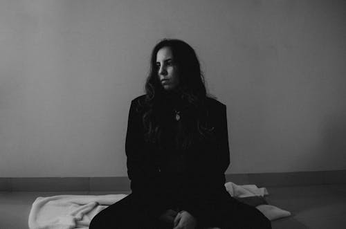 Free Portrait of a Young Brunette Wearing Black Clothes Stock Photo