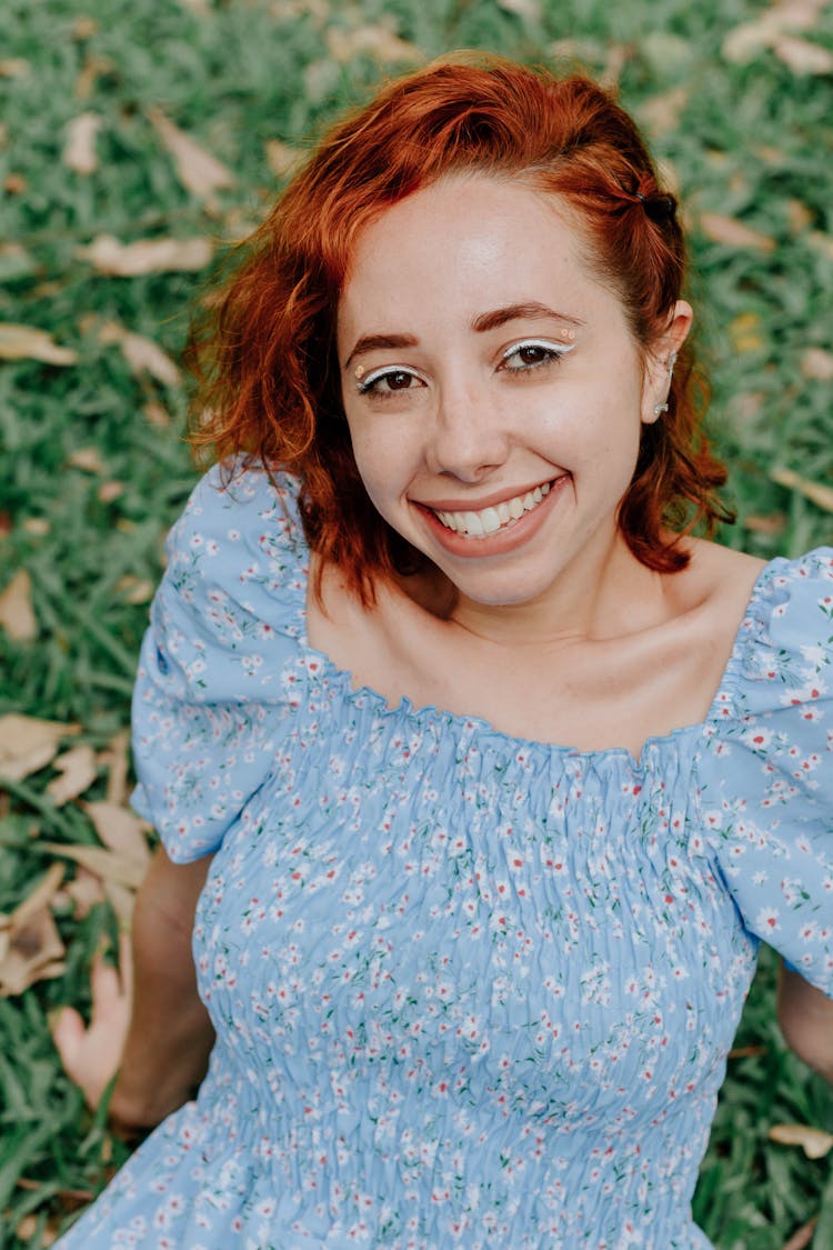 Young Redhead Woman In A Dress