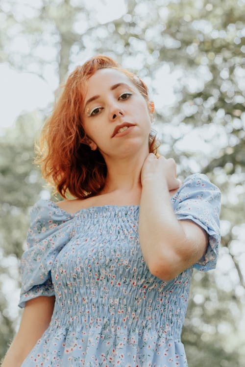 A Woman Wearing Floral Dress 