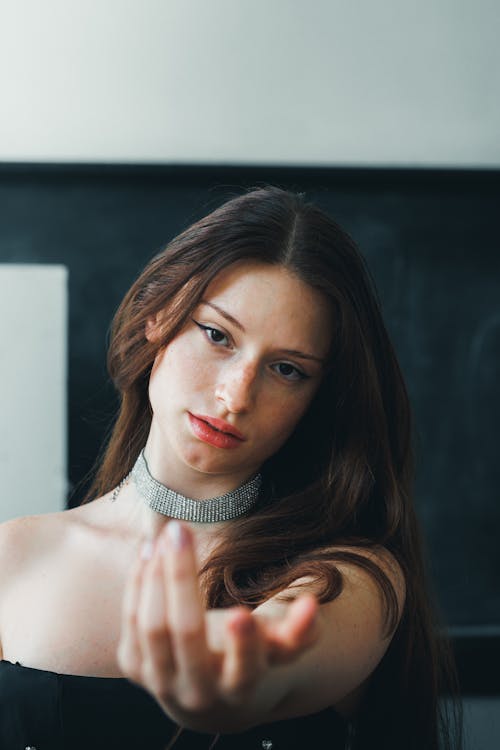 Woman with Long Hair and Freckles