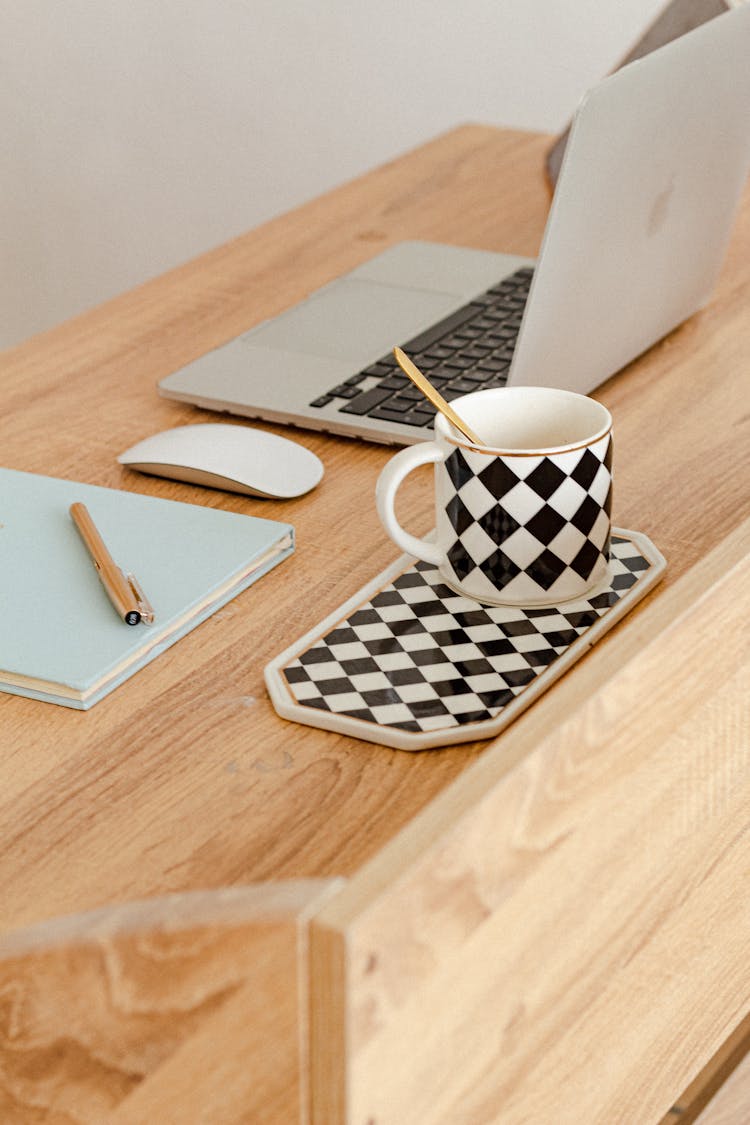 Coffee And Laptop On Desk