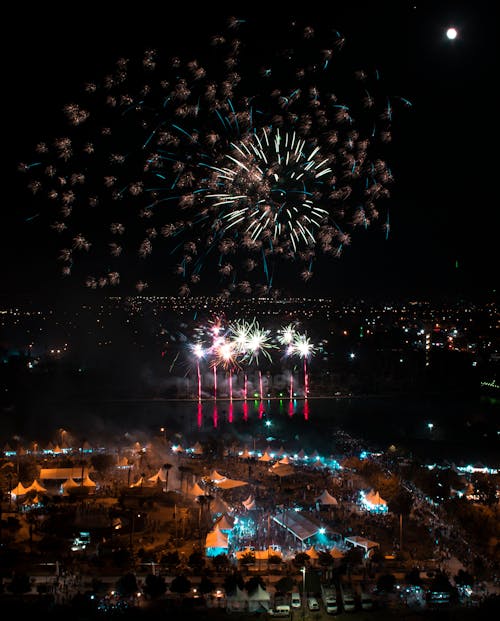 Free Fireworks Display over City during Night Time Stock Photo