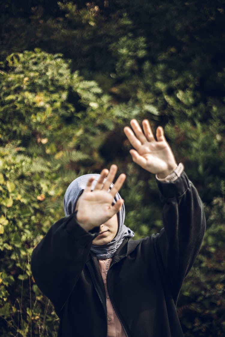 Woman Covering Face With Hands