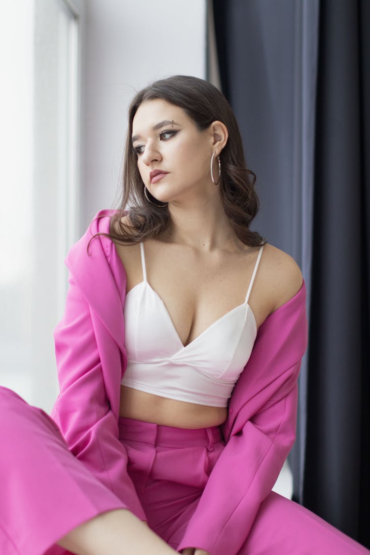 Model Posing In Pink Outfit And White Top