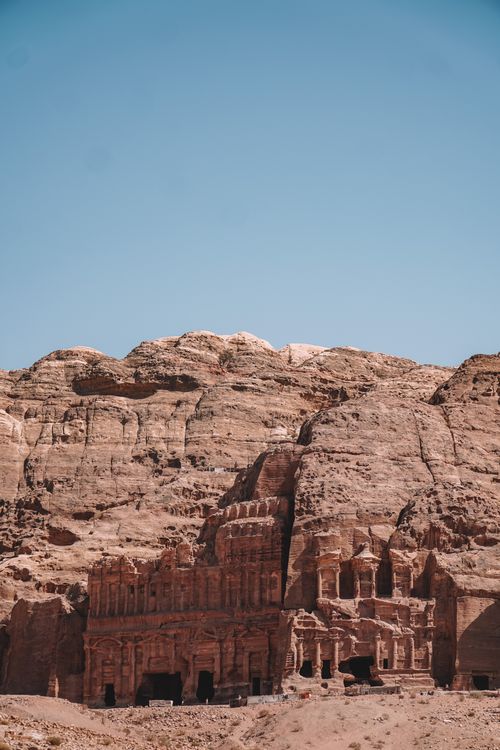 Free Explore the ancient rock-cut architecture of Petra, nestled in Jordan's desert landscape. Stock Photo