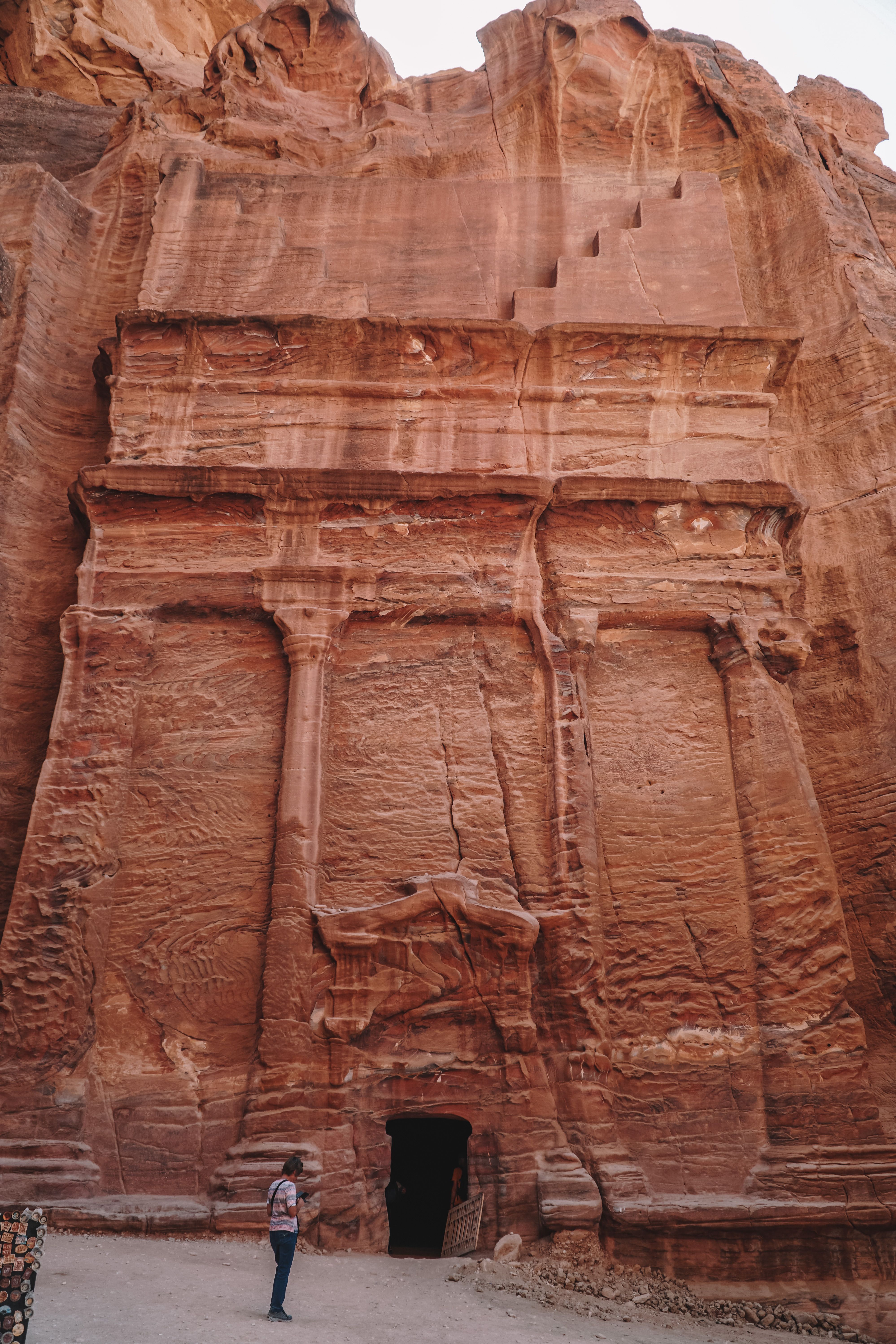 Explore the iconic carved facade in Petra, a testament to ancient artistry in Jordan's stunning landscapes.