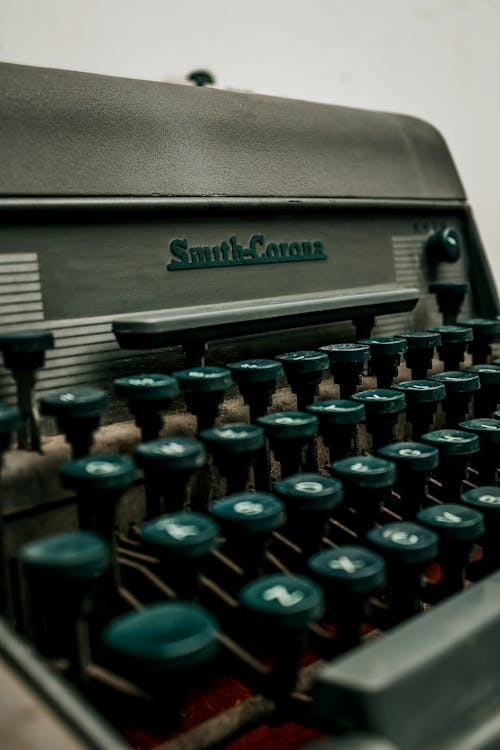 Photo of a Black and Gray Typewriter 