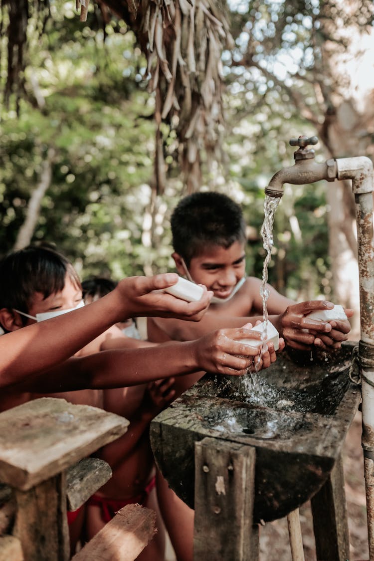 Boys Washing Their Hands