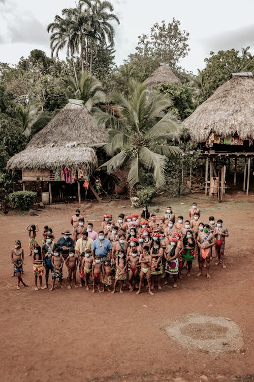 Indigenous People Standing on the Ground