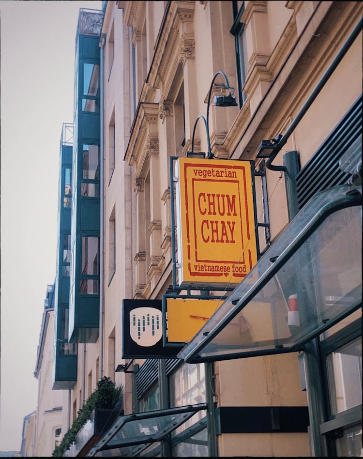 Restaurant Logo On Building Wall