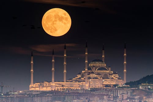 Camlica Mosque Under Night Sky with Full Moon