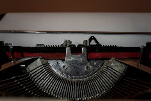 Close-up view of vintage typewriter parts highlighting the classic mechanical design.